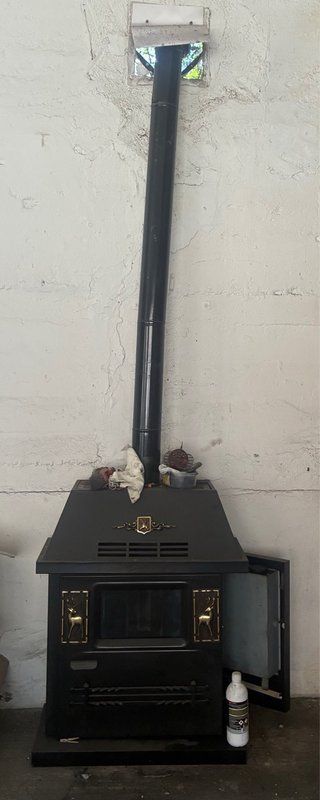 OCASION Estufa Gasoil Decorativa Negra y Dorada