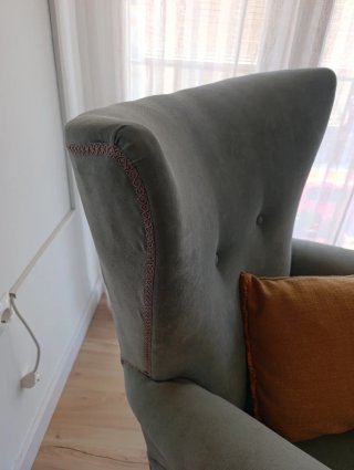 Sillón orejero azul turquesa