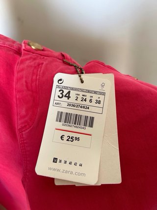 Pantalón rosa pitillo con cremallera