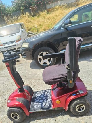 Scooter movilidad 4 ruedas eléctrico
