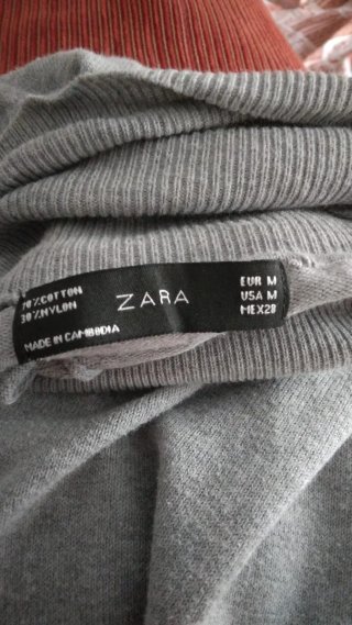 Jersey cuello alto gris