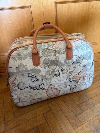 Maleta/bulto de viaje con ruedas y mapa
