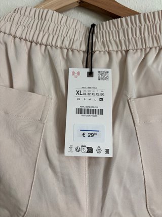 Pantalón recto Zara beige con nervio