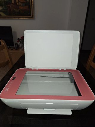 Impresora HP rosa y blanca