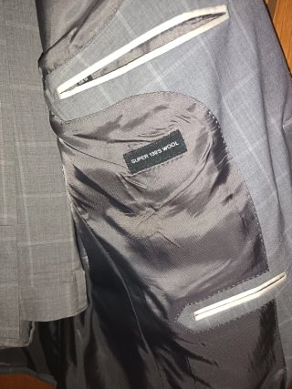 Traje de chaqueta gris a cuadros