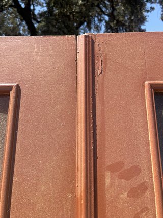 Puerta doble maciza acristalada