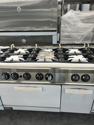Cocina 6 fuegos con horno y mueble