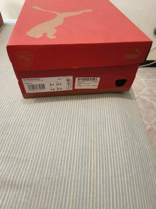 Scarpe Puma bianche e nere