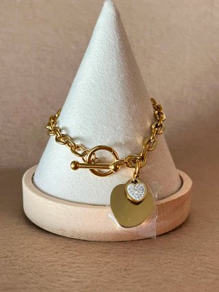 Pulsera dorada con corazón y circonitas