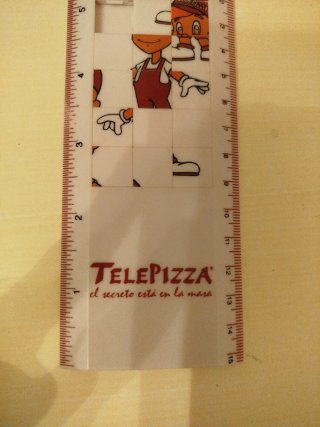 Regla Puzzle Telepizza