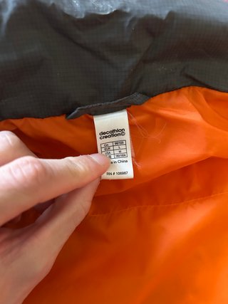 Abrigo acolchado Quechua verde y naranja
