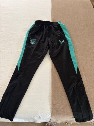 Abbigliamento sportivo Athletic Club Castore con mezza zip