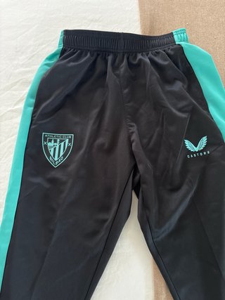 Abbigliamento sportivo Athletic Club Castore con mezza zip