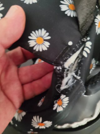 Mochila escolar con estampado de margaritas
