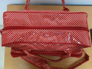 Bolso Tuc Tuc de lunares rojos para bebé