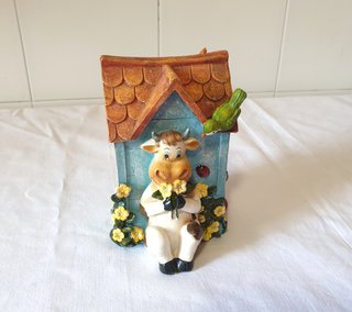 Salvadanaio portamonete in resina scolpita Vintage