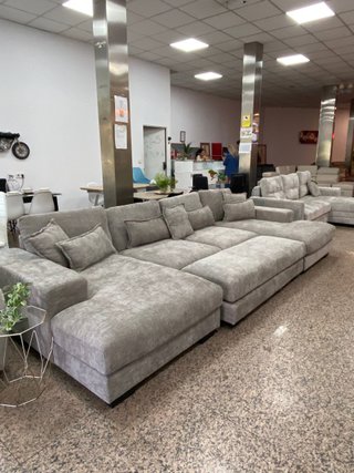 Sofá cama gris con puff CHOLLO