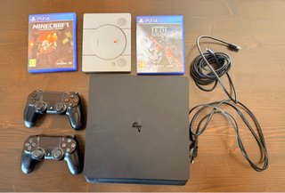 PS4 con 2 mandos y 3 juegos