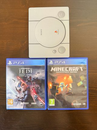 PS4 con 2 mandos y 3 juegos