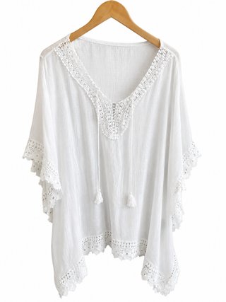 Vestido playero blanco con encaje