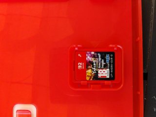 Cambio juegos de Switch 2 en mano en Granada