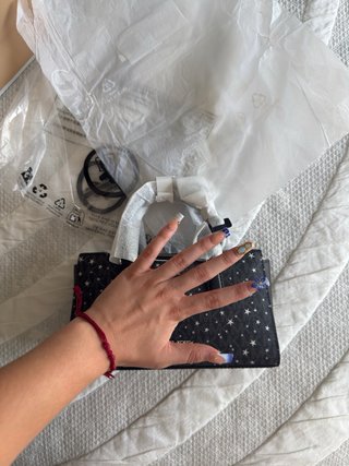 Bolso Michael Kors negro con estrellas