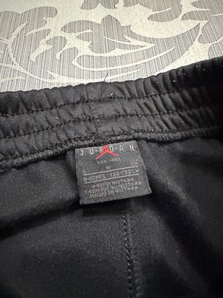 Tuta Jordan nera con logo