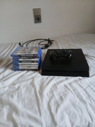 PS4 (PlayStation 4) + 8 Juegos