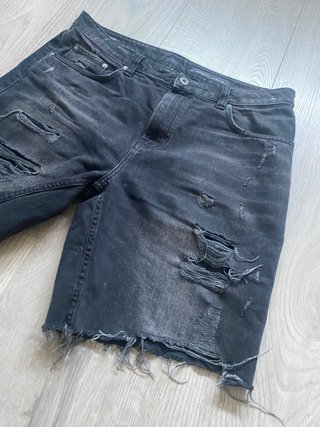 Pantalón vaquero roto negro