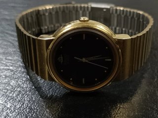 Reloj Seiko Dorado y Negro