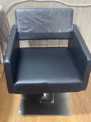 Sillón de peluquería negro