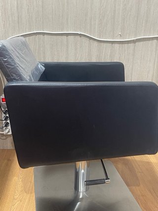 Sillón de peluquería negro