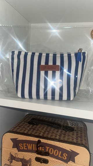 Neceseres/Carteras de mano etc..