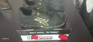 Zapatos de seguridad U-Power negros y dorados