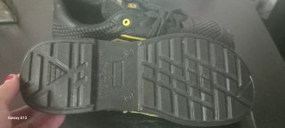 Zapatos de seguridad U-Power negros y dorados