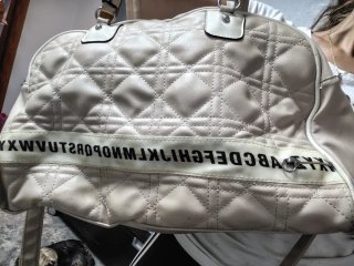Bolso beige acolchado
