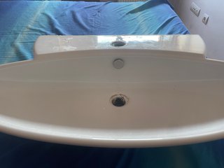 Lavabo de cerámica blanco