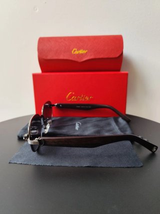 Gafas de sol Cartier negro y marrón