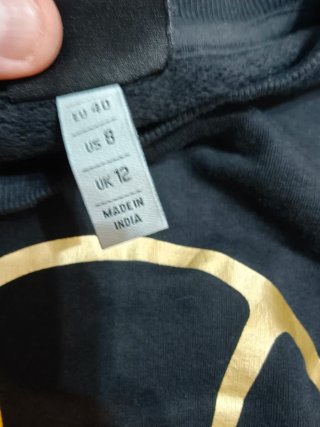 Sudadera Ellesse negra logo dorado