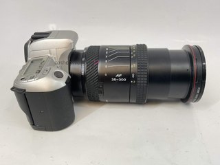 camara reflex minolta 404si dynax + tokina 35-300 1:4.5-6.7