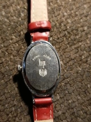 Reloj HP Ovalado Correa Roja y Plata