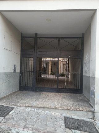 Portón de hierro forjado