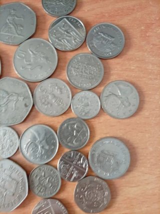 Lote de 25 monedas Inglesas antiguas y modernas