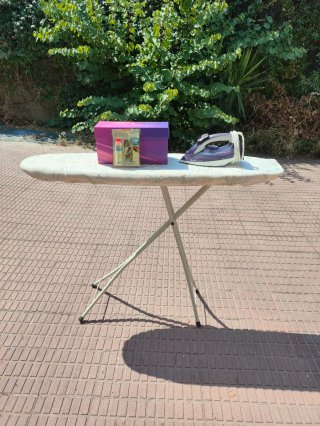 Plancha + tabla + liquido limpieza