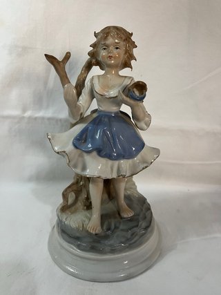 Set Porcelana Landex: Reloj y Figuras