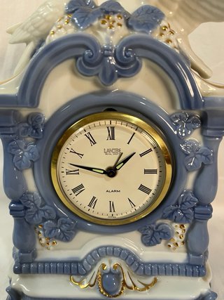 Set Porcelana Landex: Reloj y Figuras