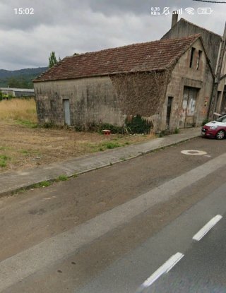 Finca urbana con pequeña nave