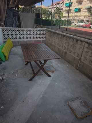 Mesa de exterior de teca plegabe