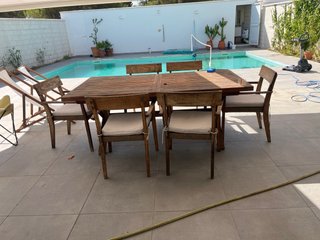 Conjunto de mesa extensible y 6 sillones