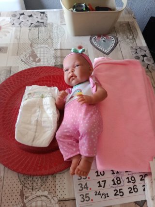 Carrito de muñecas rosa